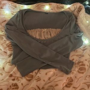 blue long sleeve shirt with white accent with bow